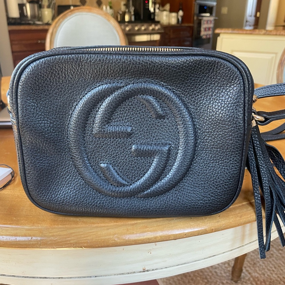 Gucci Black Crossbody Bag with Pebbled Leather and Tassel
